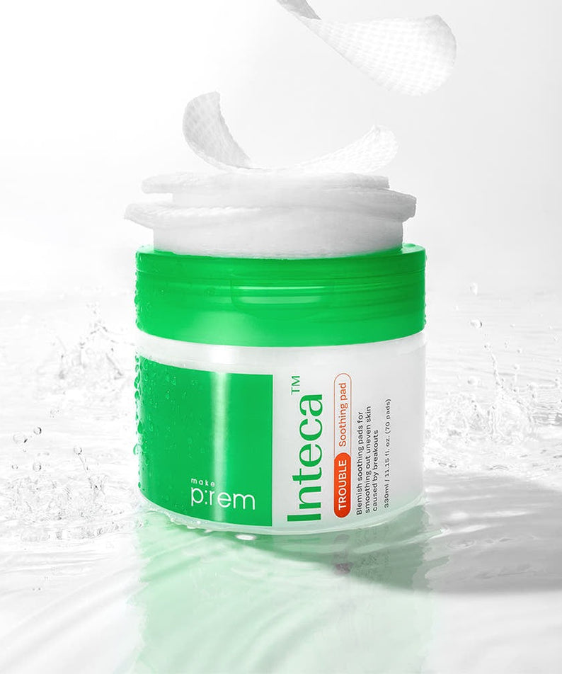 MAKE P:REM Inteca Trouble Soothing Pads 70 sheets in a green jar, ideal for skincare, with water droplets.