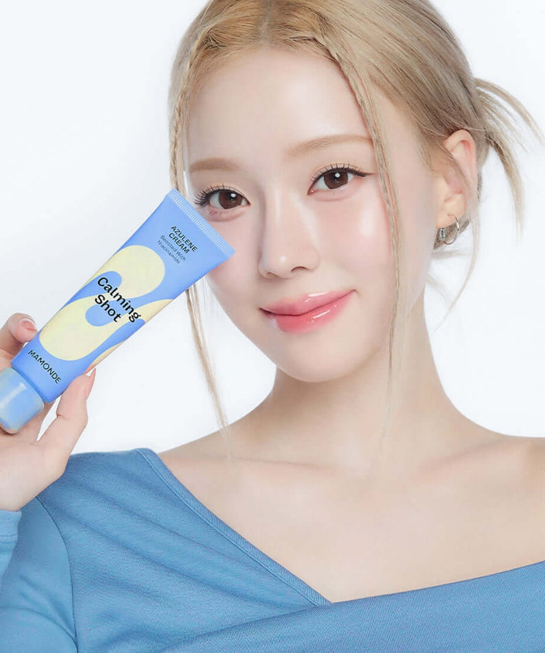 Woman holding MAMONDE Calming Shot Azulene Cream 60ml tube