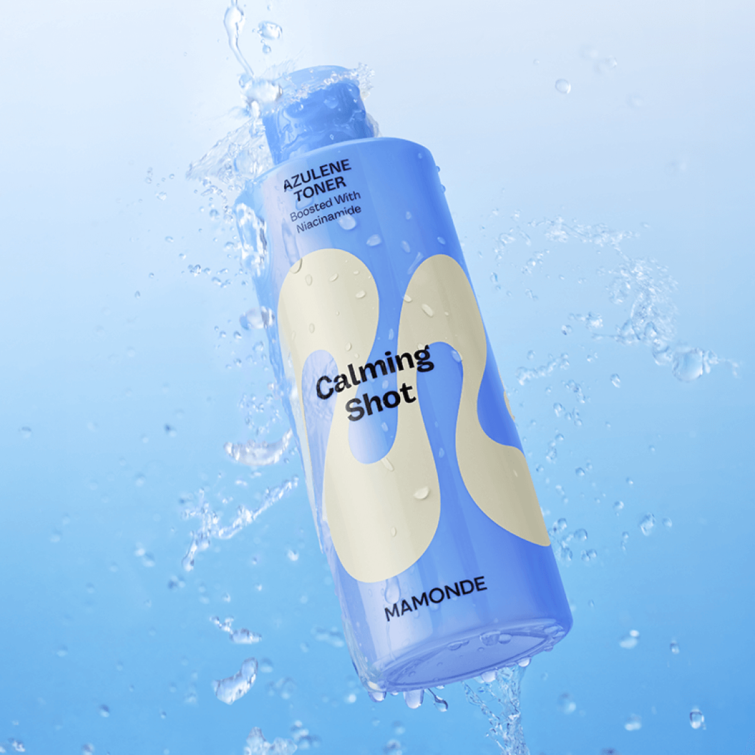 MAMONDE Calming Shot Azulene Toner 300ml bottle with water splash on blue background