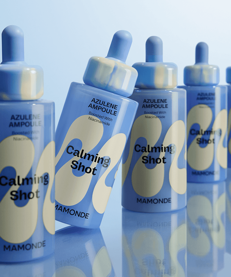 MAMONDE Calming Shot Azulene Trace Moisture Ampoule 50ml bottles displayed in a row against a light blue background