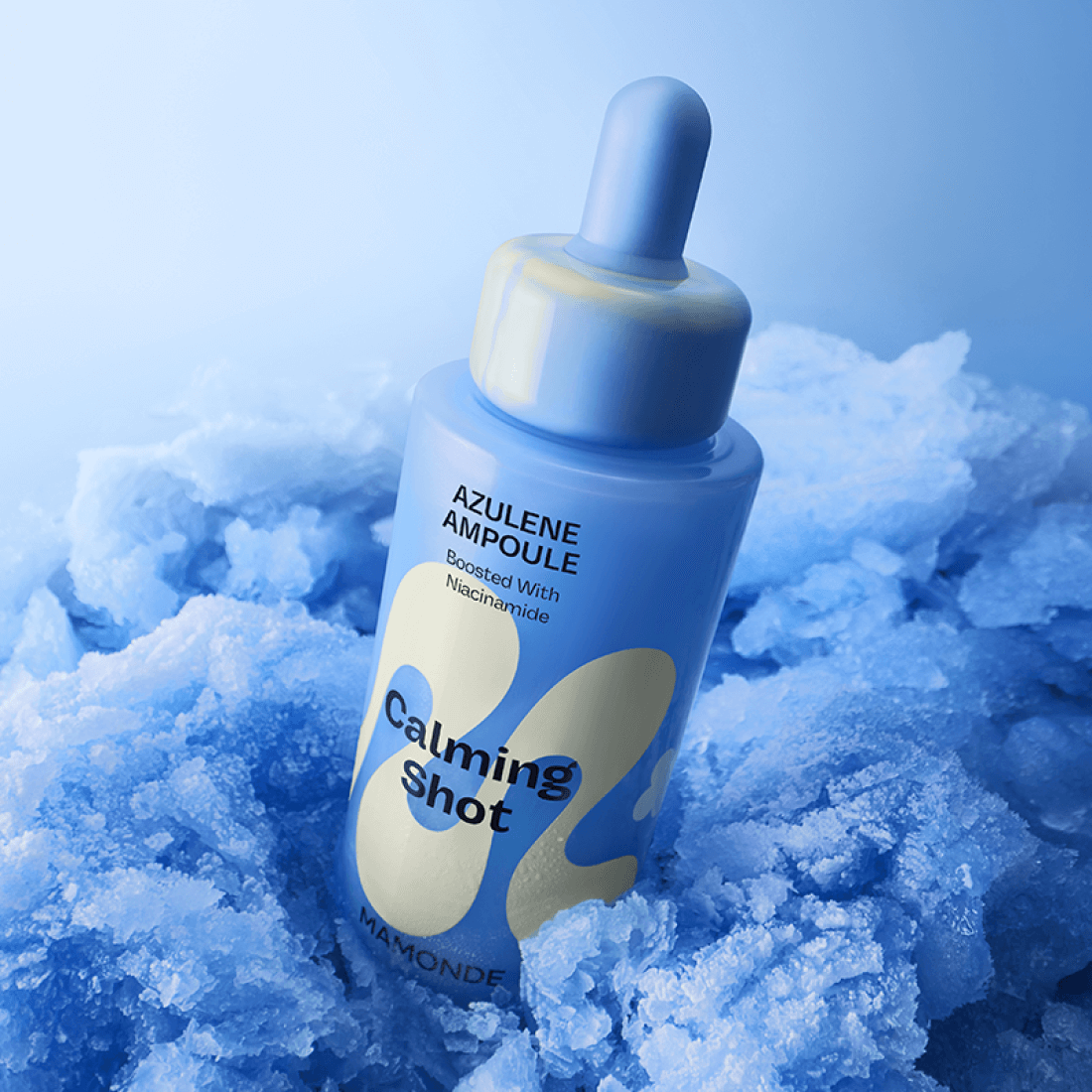 MAMONDE Calming Shot Azulene Trace Moisture Ampoule 50ml with niacinamide, displayed on icy blue background, for calming skin care.