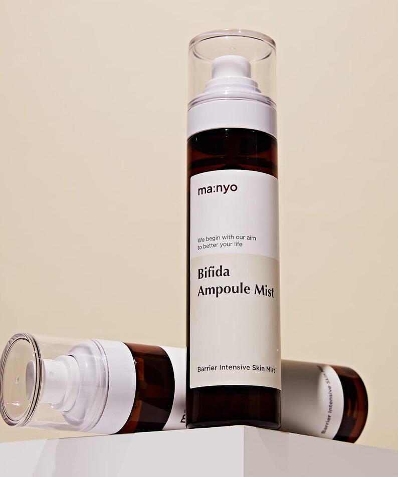 MANYO Bifida Ampoule Mist 120ml skincare product displayed on a pedestal.