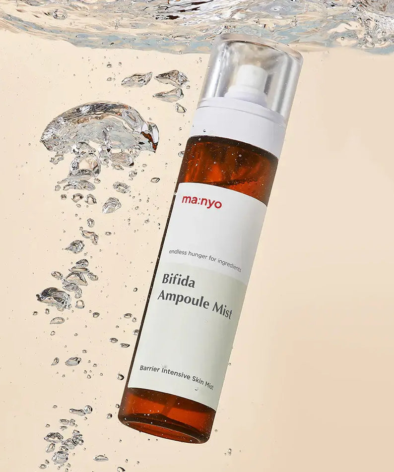 MANYO Bifida Ampoule Mist 120ml floating in water, showcasing its hydrating properties and designed for intensive skin barrier care.