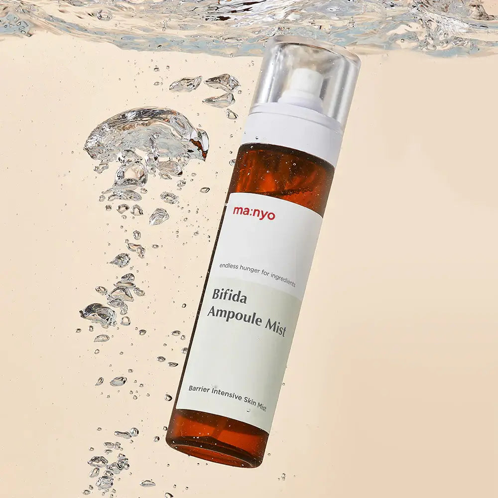MANYO Bifida Ampoule Mist 120ml floating in water, showcasing its hydrating properties and designed for intensive skin barrier care.