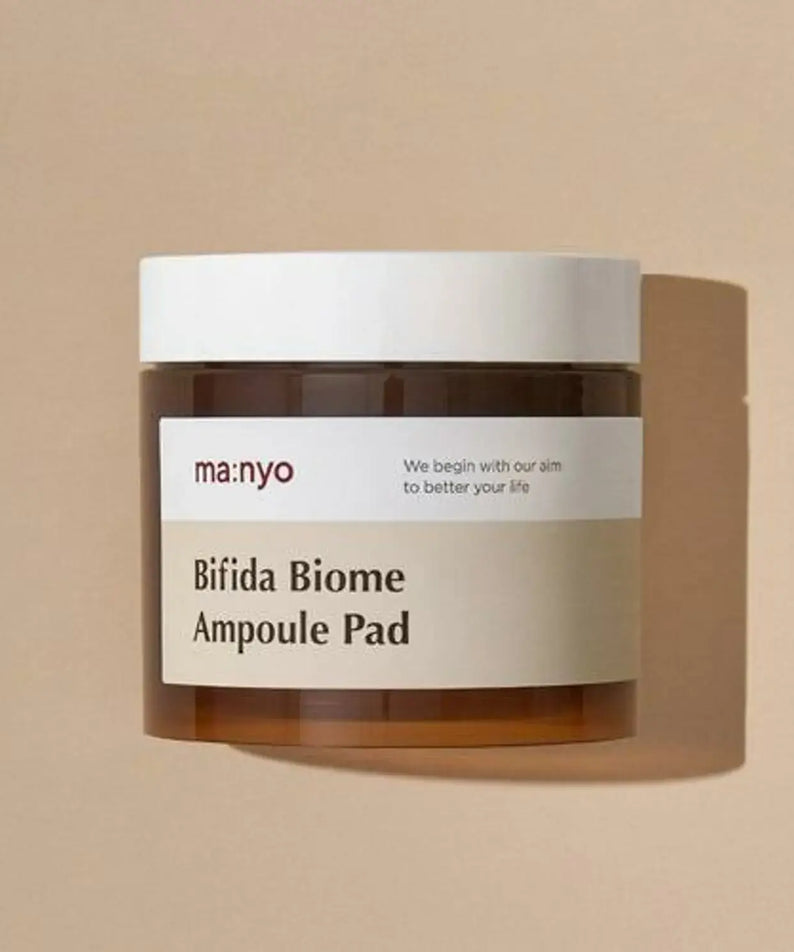 MANYO Bifida Biome Ampoule Pad 70 Sheets jar on beige background