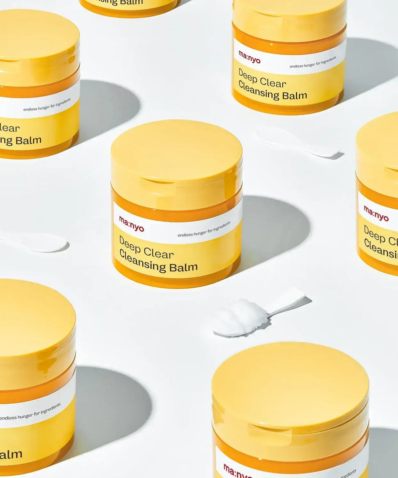 MANYO Deep Clear Cleansing Balm 132ml jars displayed with spatula on a white background.
