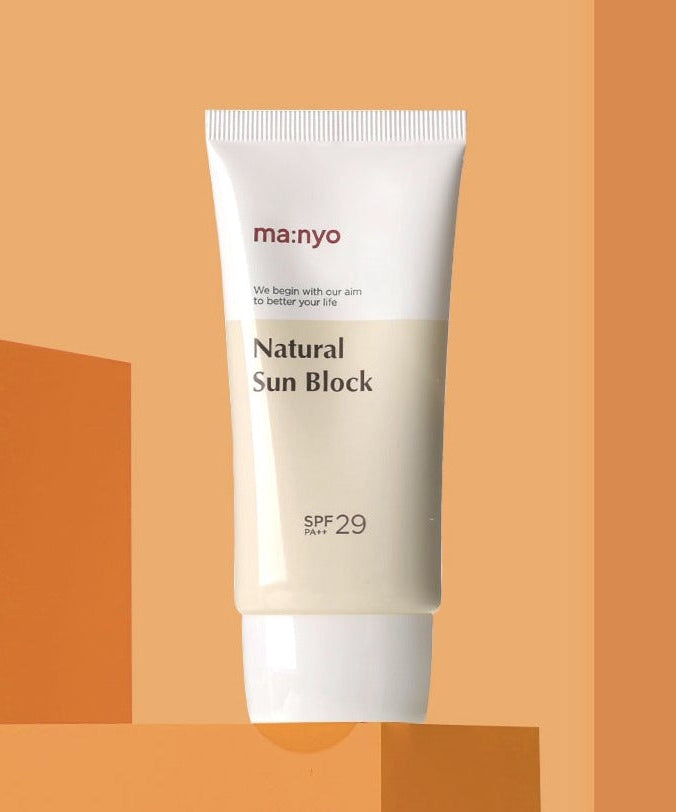 MA:NYO Natural Sun Block SPF 29 50ml sunscreen tube on orange background