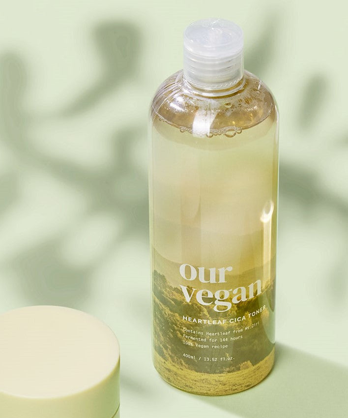 Image of MA:NYO Our Vegan Heartleaf Cica Toner 400ml bottle on a light green background with soft shadows.
