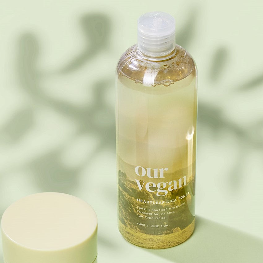 Image of MA:NYO Our Vegan Heartleaf Cica Toner 400ml bottle on a light green background with soft shadows.