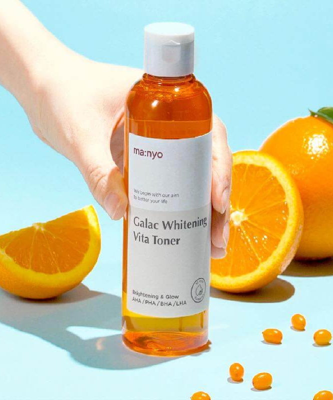 MA:NYO V Galac Whitening Vita Toner 210ml bottle with oranges enhancing brightening and glow benefits.