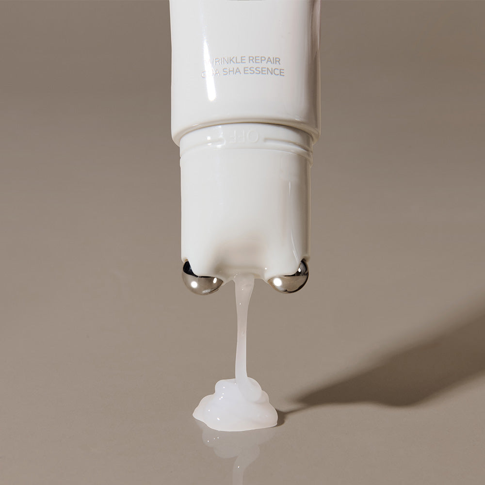 MARSHIQUE Wrinkle Repair Guasha Essence 45ml shown with product creamy texture against a neutral background.