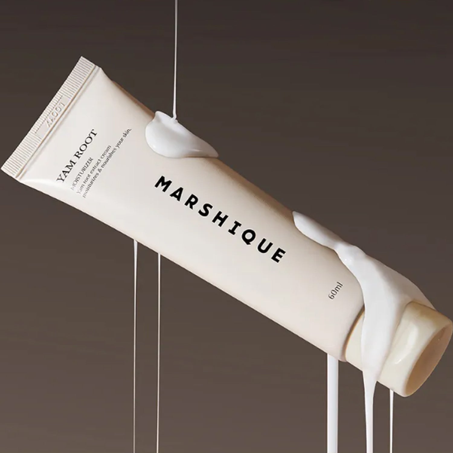 MARSHIQUE Yam Moisture Nourishing Cream 60ml tube with cream texture flowing down