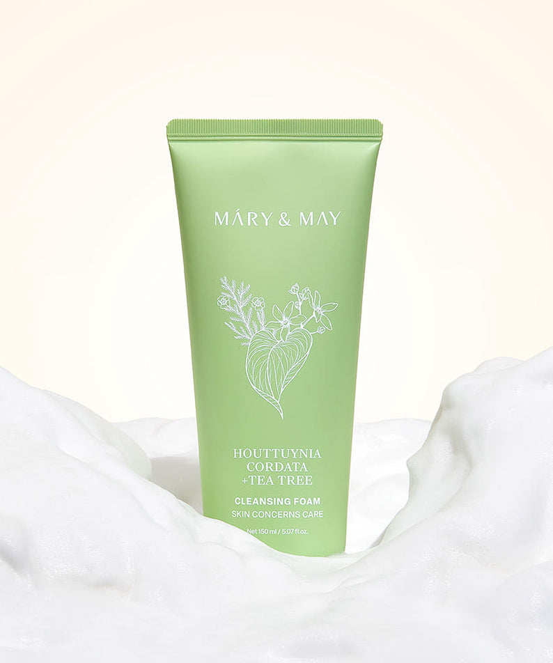 MARY&MAY Tea Tree Pore Cleansing Foam 150ml with foamy texture in background