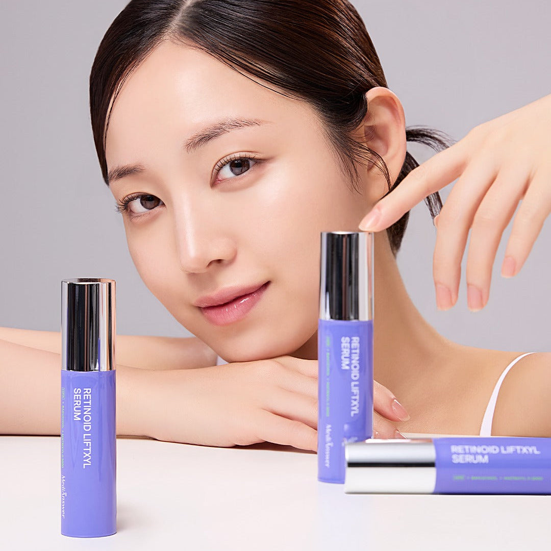 Woman posing with MEDIANSWER Retinoid Liftsil Serum 30ml, showcasing its sleek design and skincare benefits.