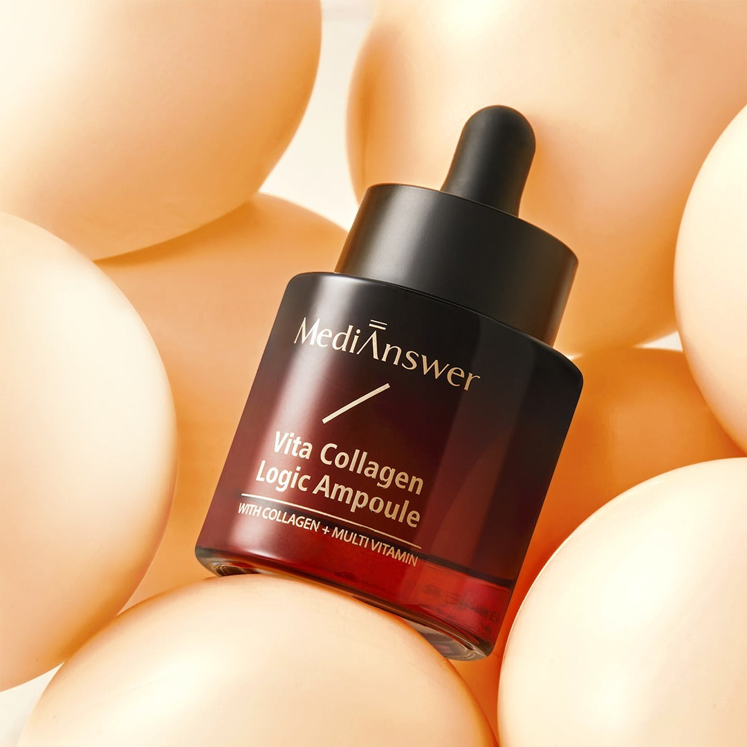 MEDIANSWER Vita Collagen Logic Ampoule surrounded by soft, light-colored spheres, highlighting the skincare product's elegant design.