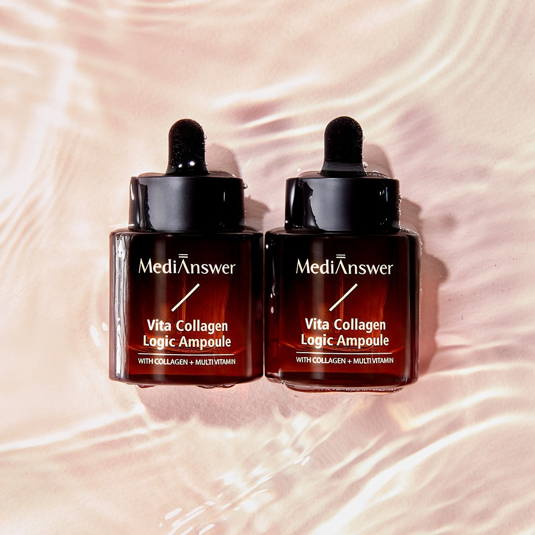 Two bottles of MEDIANSWER Vita Collagen Logic Ampoule skincare product with droppers, placed on a textured surface.