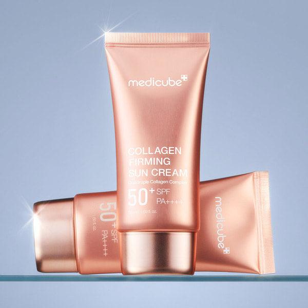 MEDICUBE Collagen Firming Sun Cream 50ml tubes displayed on a shelf
