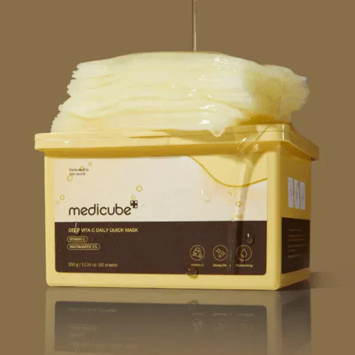 MEDICUBE Deep Vita C Daily Quick Mask 30 Sheets packaging with wet mask sheets piled on top.