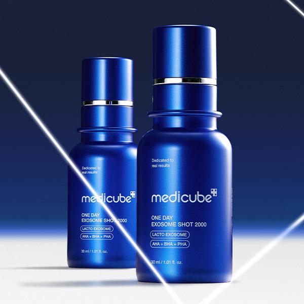 MEDICUBE One Day Exosome Shot 7500 30ml skincare serum in blue bottles on a gradient background