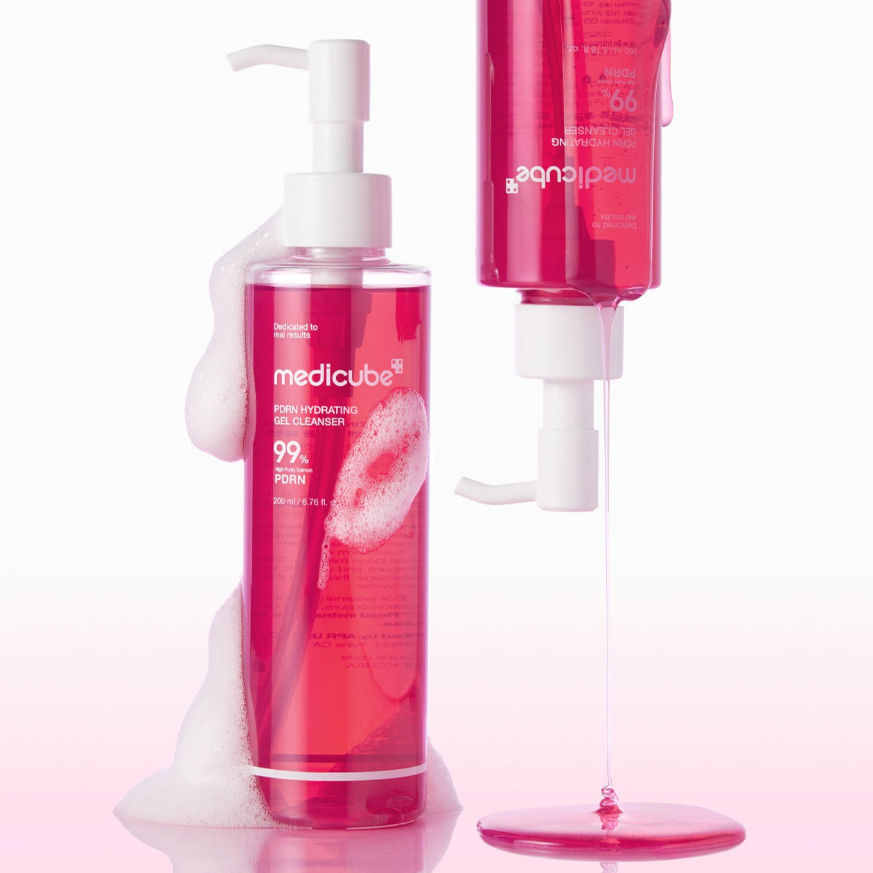 MEDICUBE PDRN Gel-To-Foam Cleanser 200ml bottle with foam, highlighting the hydrating and cleansing properties of the skincare product.