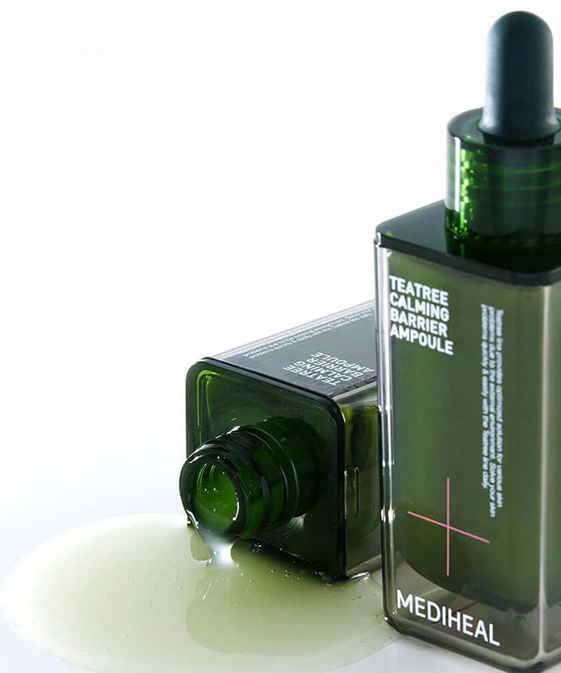 MEDIHEAL Tea Tree Soothing Barrier Ampoule 50ml with open bottle and spilled serum on white background.