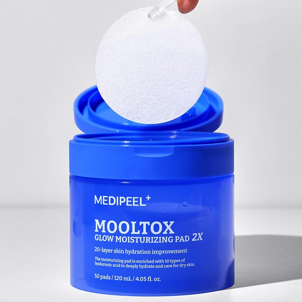 MEDIPEEL Water Tox Glow Moisturizing Pads 50 Sheets in blue container with pads on top showcasing hydration benefits.