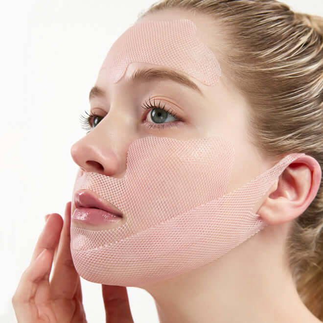 Woman applying MEDITHERAPY Inmotox Tension Up Mask 25gX5 to face for skin care