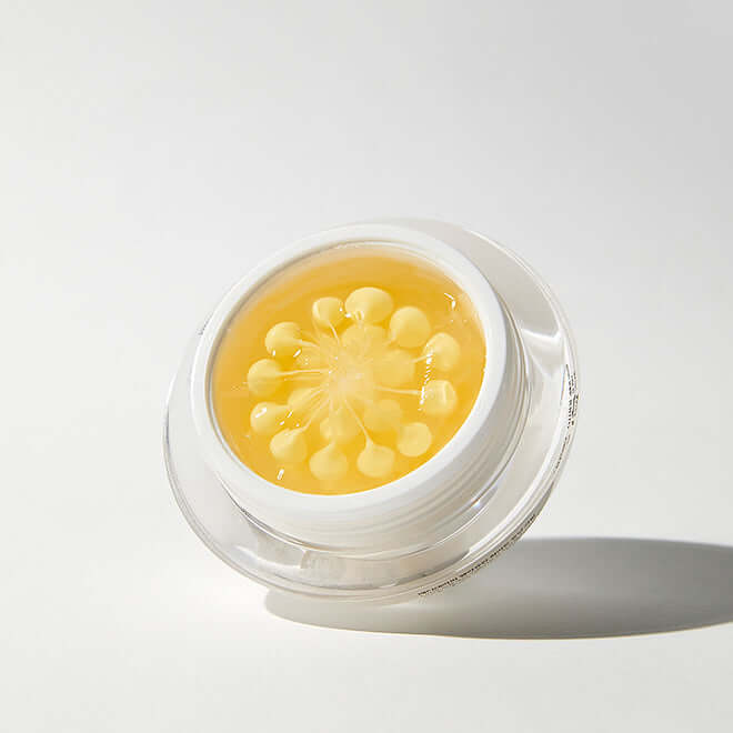 MEDITHERAPY Melageran White Toning Cream 50ml + EMS Device in open container showing yellow cream.