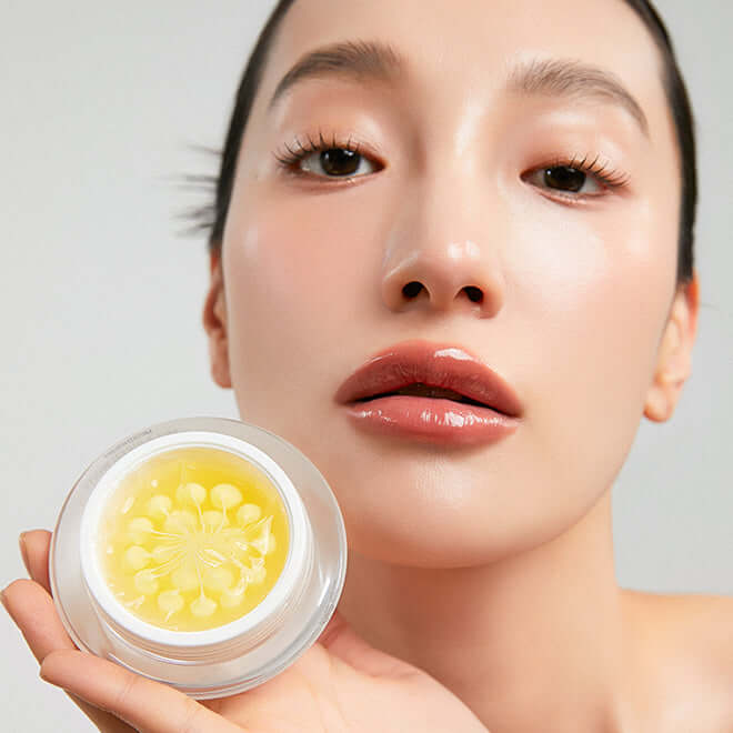 Person holding a jar of MEDITHERAPY Melegran White Toning Cream Single Product 50ml with a close-up view of the cream