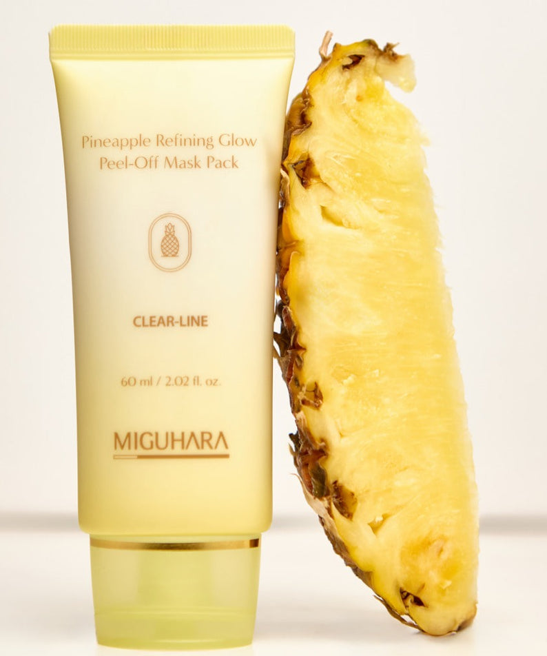 MIGUHARA Pineapple Refining Glow Peel Off Mask Pack 60ml next to a fresh pineapple slice, highlighting skincare benefits.