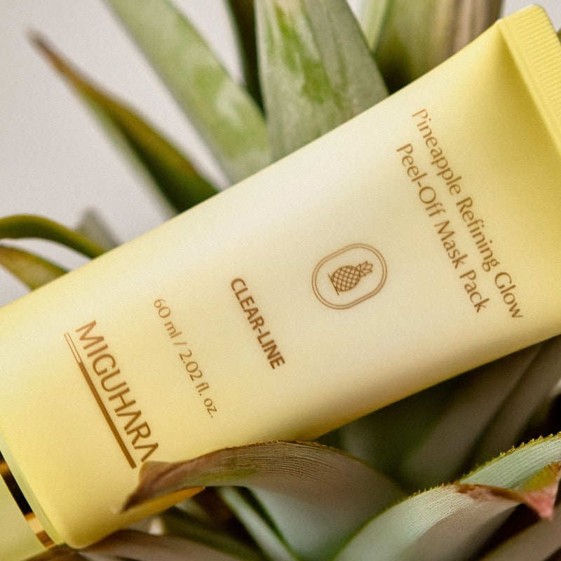 MIGUHARA Pineapple Refining Glow Peel Off Mask Pack 60ml with fresh pineapple background, highlighting skincare product features