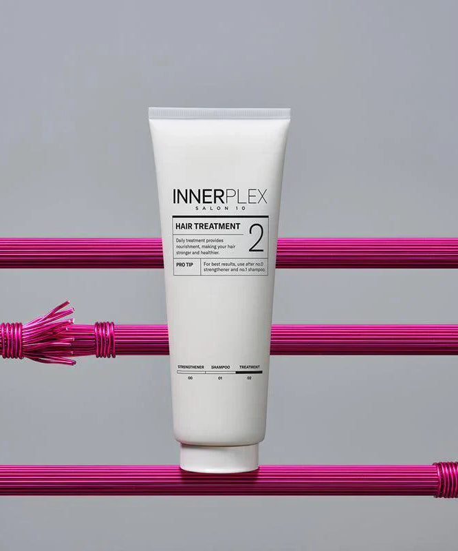 MISE EN SCENE Innerplex Hair Strengthening Treatment 240g product image with vibrant design background.