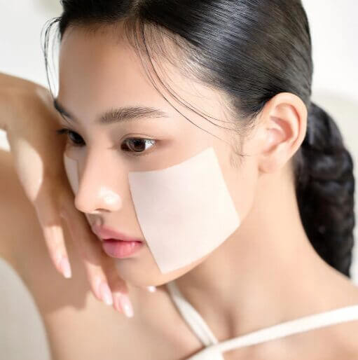 Woman using MIXSOON Bean Toner Pad on face for skincare