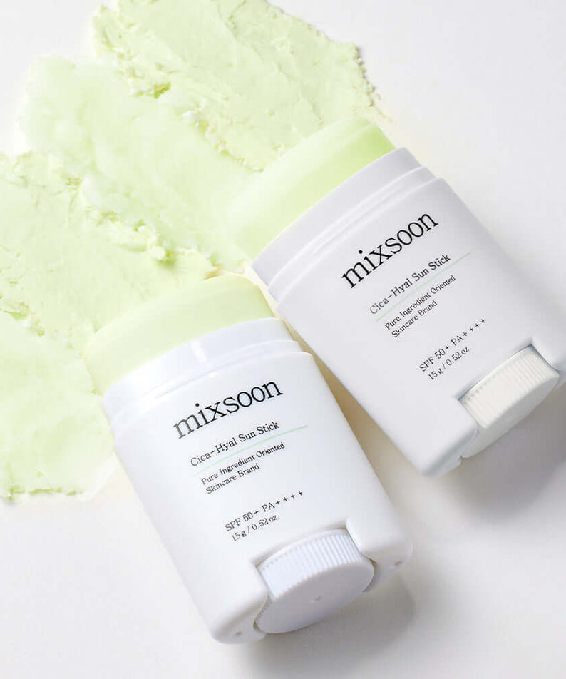 MIXSOON Cica Hyal Sun Stick displayed on green texture background, highlighting its SPF protection and soothing properties.