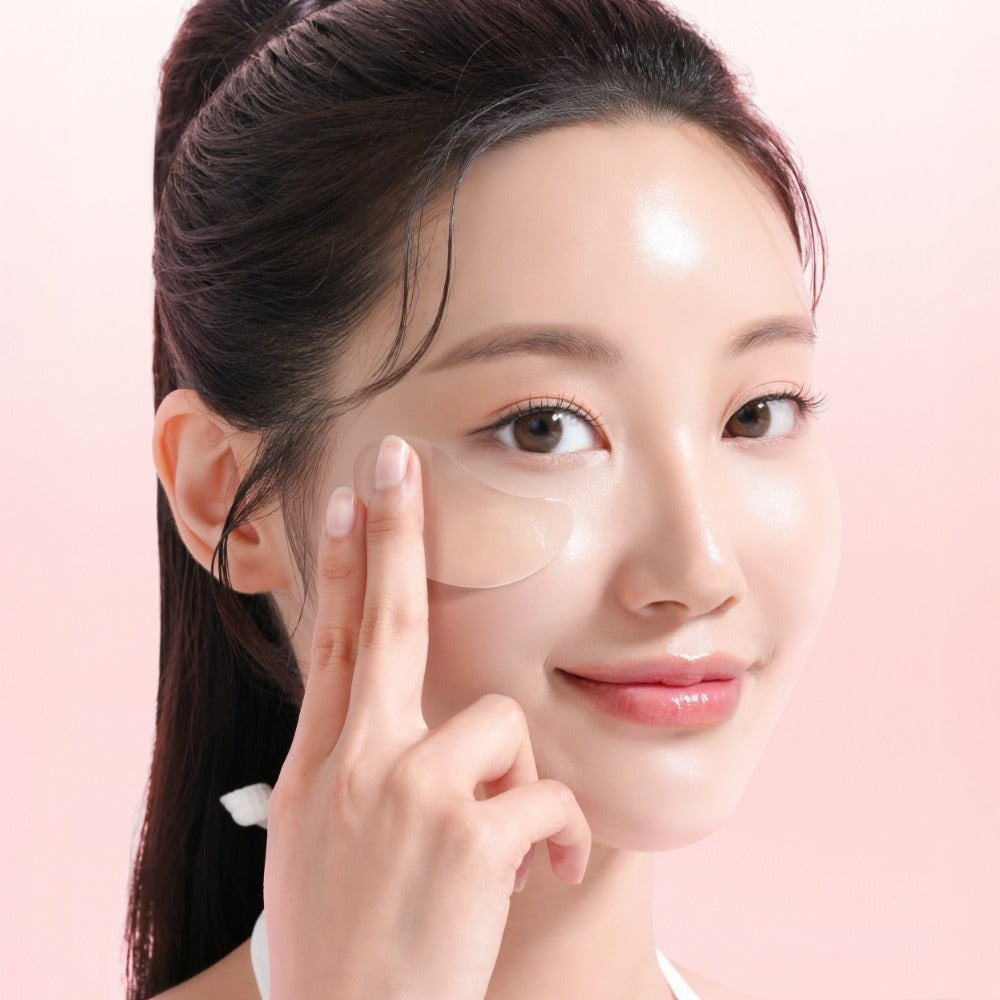 Woman applying MIXSOON Collagen Hydrogel Eye Patch Single Pack 5 Sheets