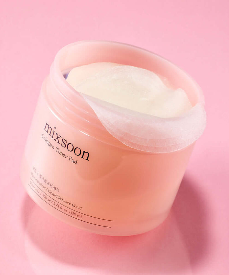 MIXSOON Collagen Toner Pad container with open lid on a pink background, showcasing the skincare product's soothing and hydrating pads.
