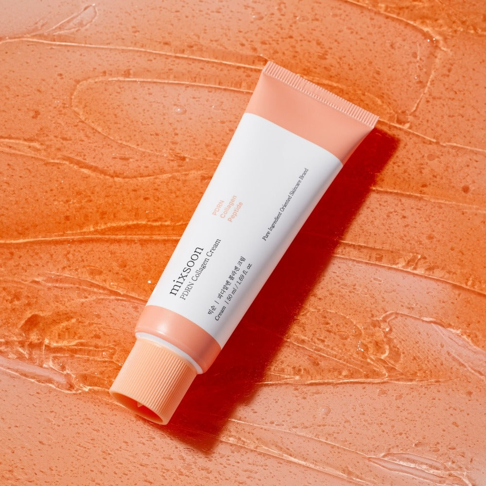 MIXSOON PDRN Collagen Cream 50ml in a stylish orange tube on textured background