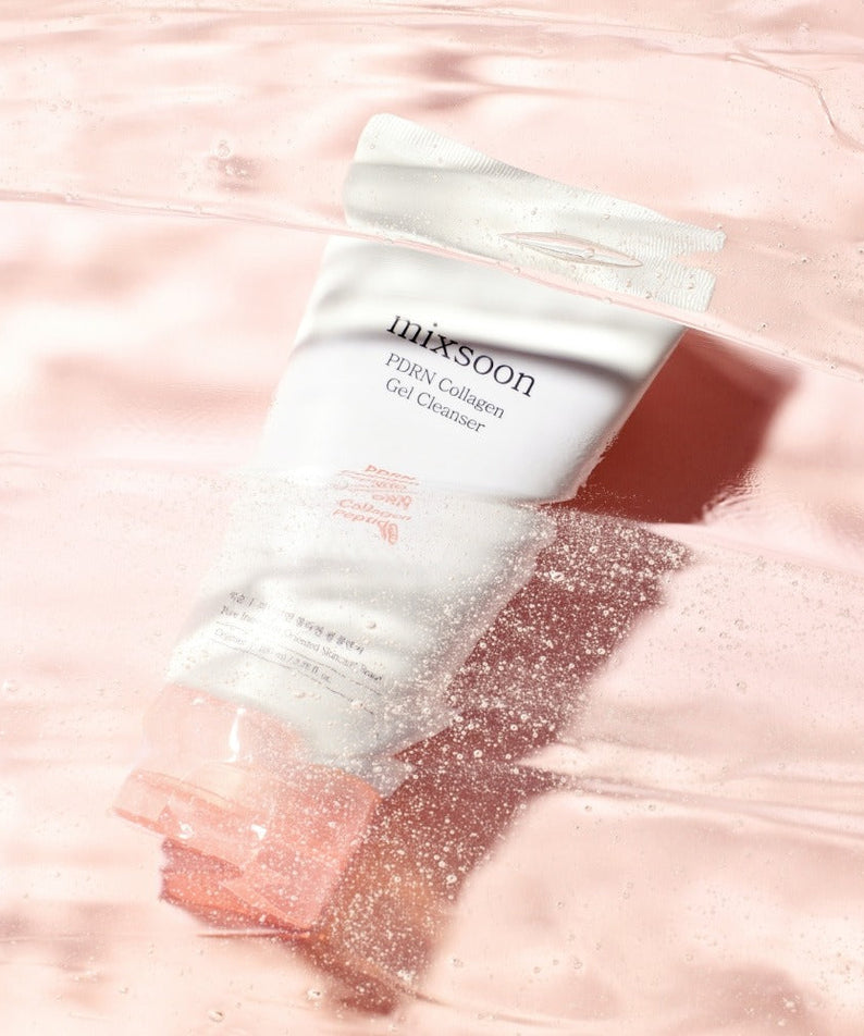 MIXSOON PDRN Collagen Gel Cleanser 100ml tube in water with pink background