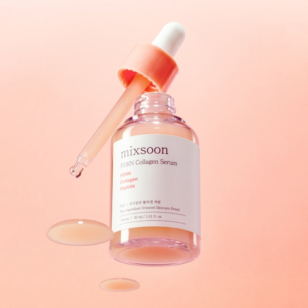 MIXSOON PDRN Collagen Serum 30ml with dropper and serum splashes on a pink background