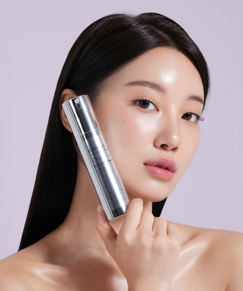 Woman holding MIXSOON Peptide Cica Hyal Shot 150 50ml skincare product against pastel background