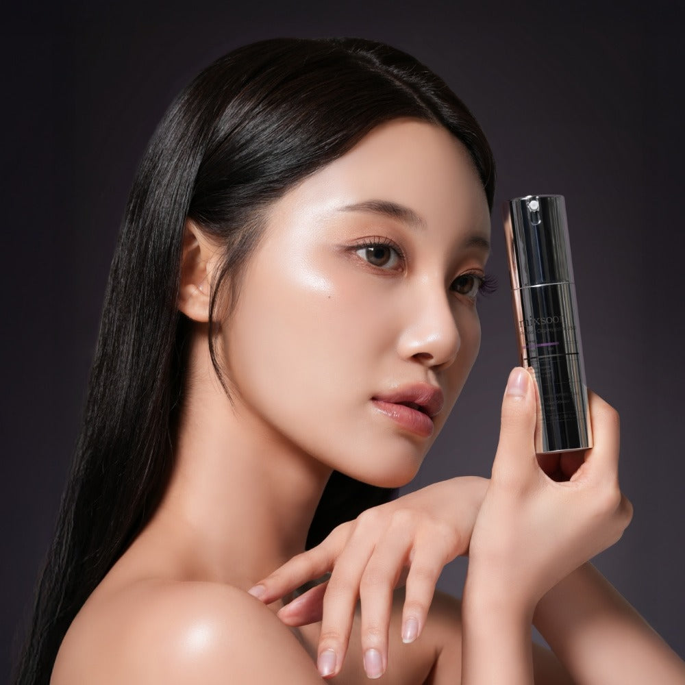 Woman holding MIXSOON Peptide Cica Hyal Shot 350 30ml skincare product