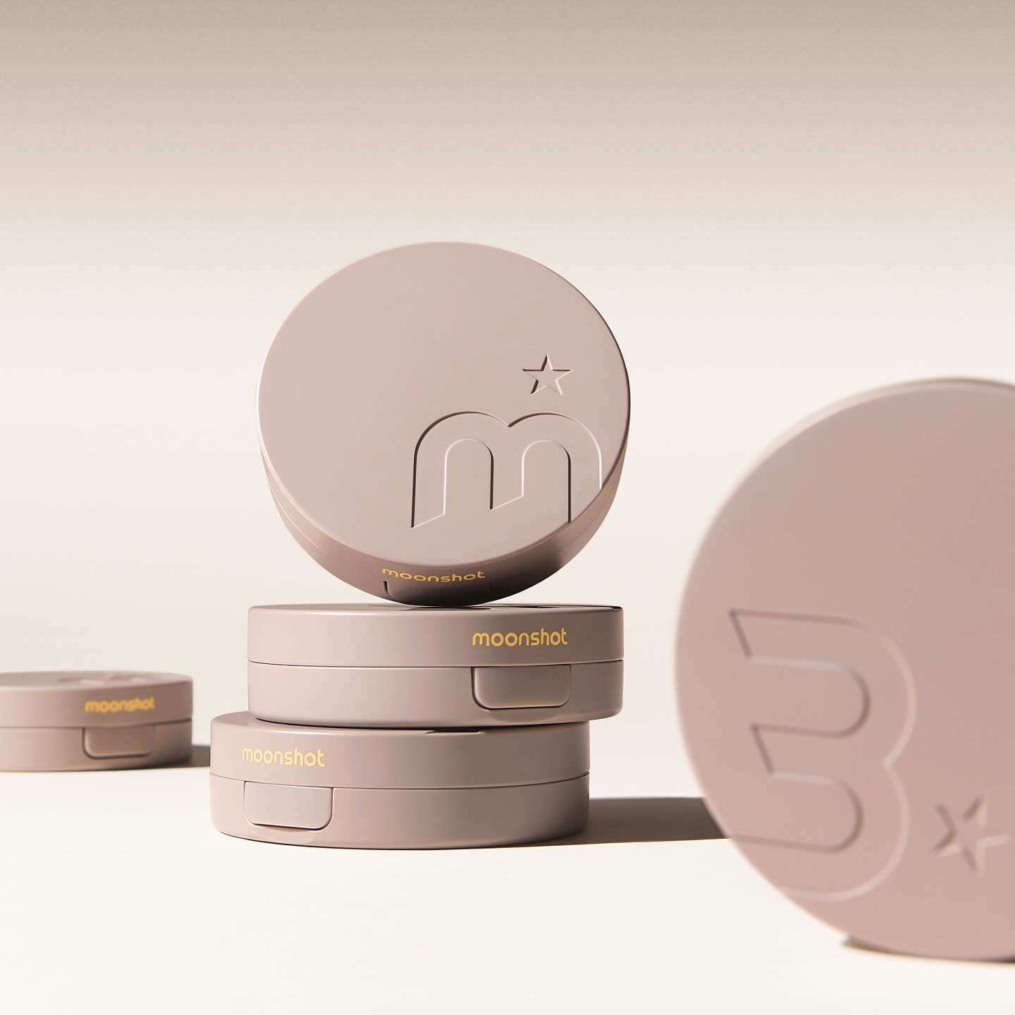MOONSHOT Conscious Fit Cushion Foundation in stack, showcasing product design and branding.