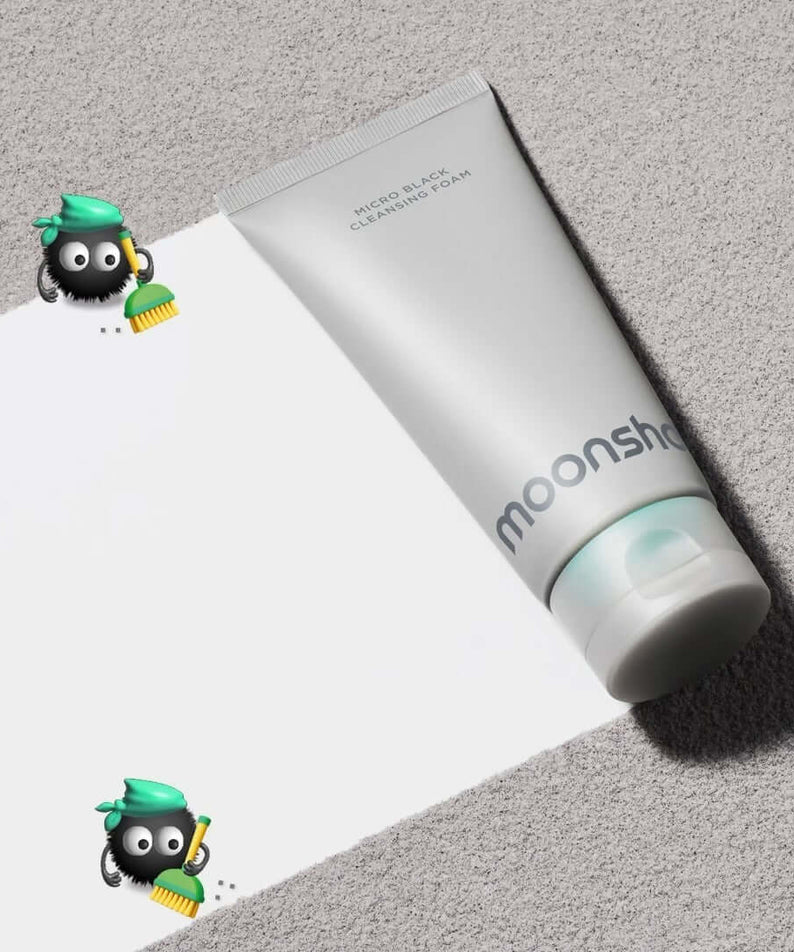 Image of MOONSHOT Micro Black Cleansing Foam tube on a light background with cartoon brushes.
