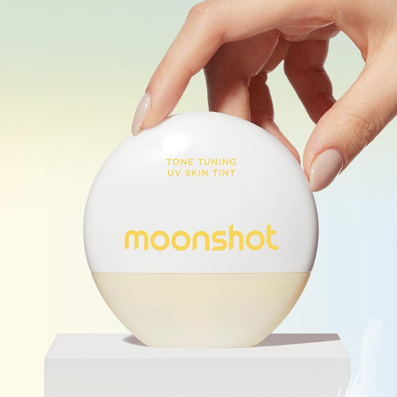 MOONSHOT Tone Tuning UV Skin Tint SPF50+ PA++++ product image with hand holding the round cream white container.