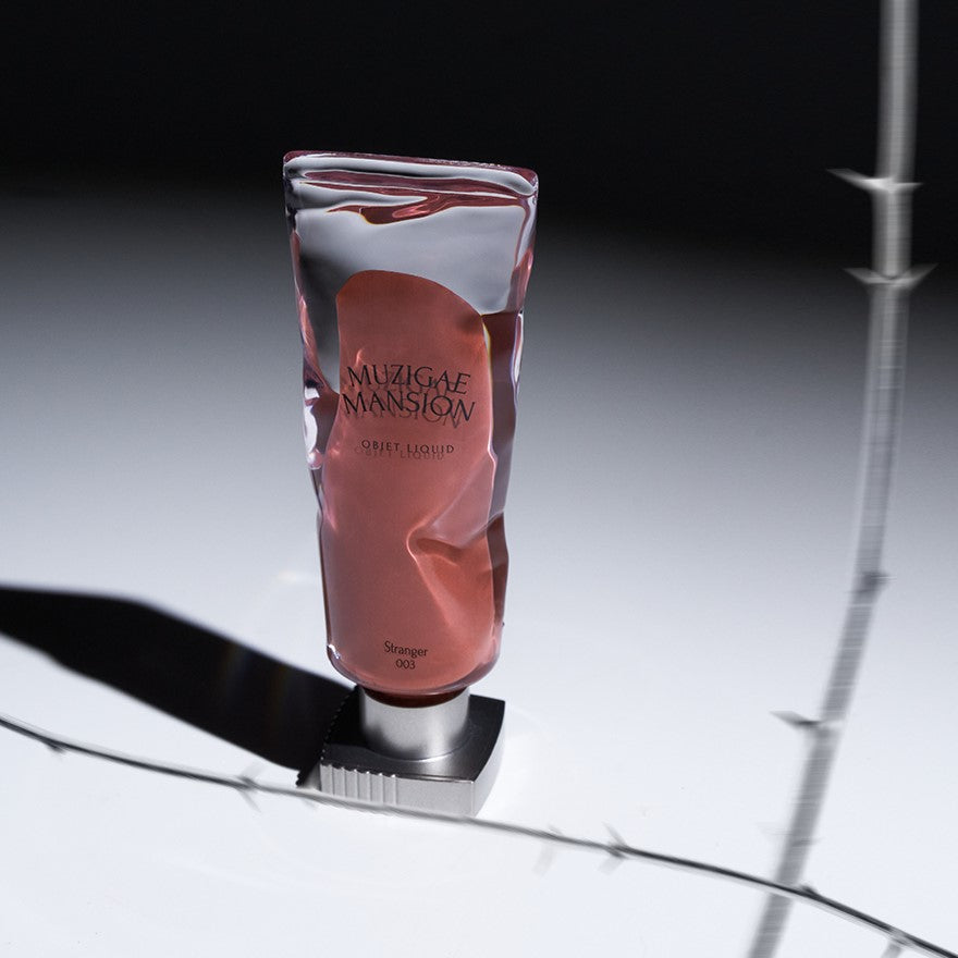 MUZIGAE MANSION Objet Liquid Tint in unique packaging on display
