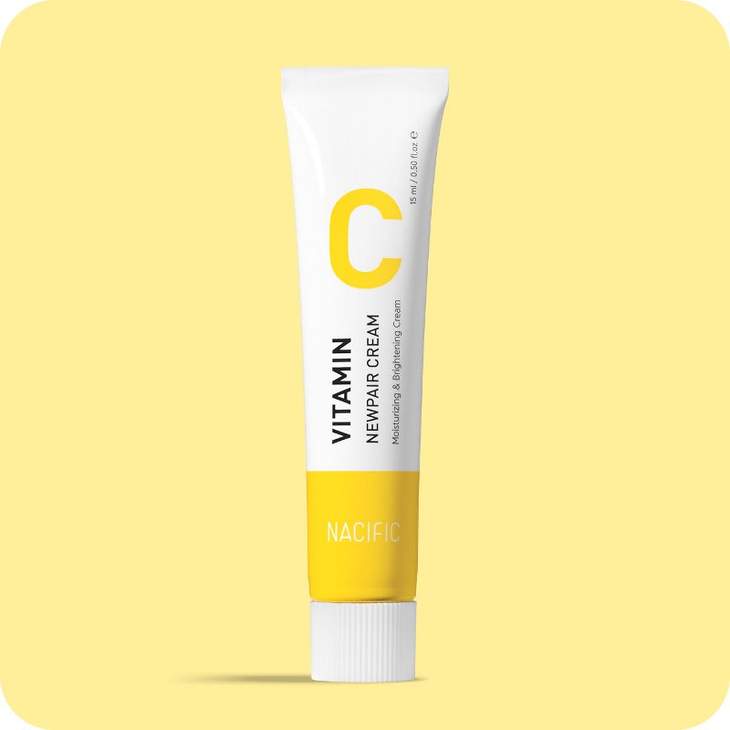 NACIFIC Vitamin C New Pair Cream 15ml in a yellow tube against a soft yellow background.