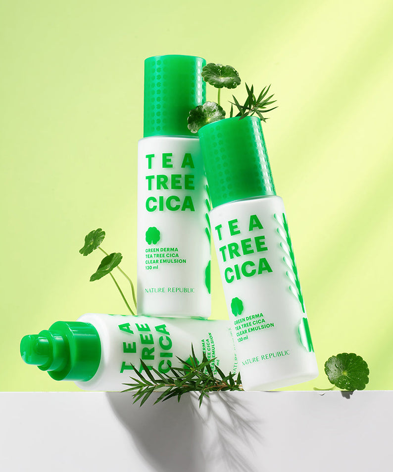 NATURE REPUBLIC Green Derma Tea Tree Cica Clear Emulsion 130ml bottles with green herbal elements and vibrant background.