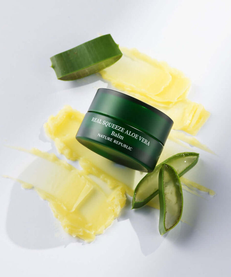 NATURE REPUBLIC Real Squeeze ALoe Vera Balm 25g with aloe leaves and balm spread on white surface.