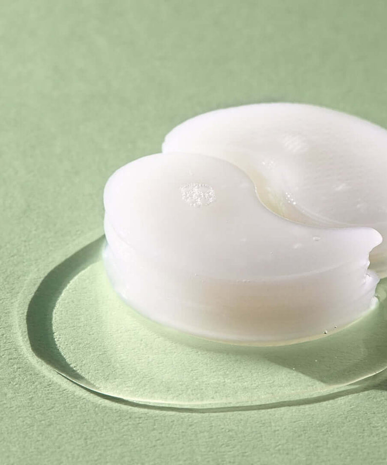 NATURE REPUBLIC Real Sueeze Aloe Vera Hydrogel Eye Patchh 60sheets on a green background