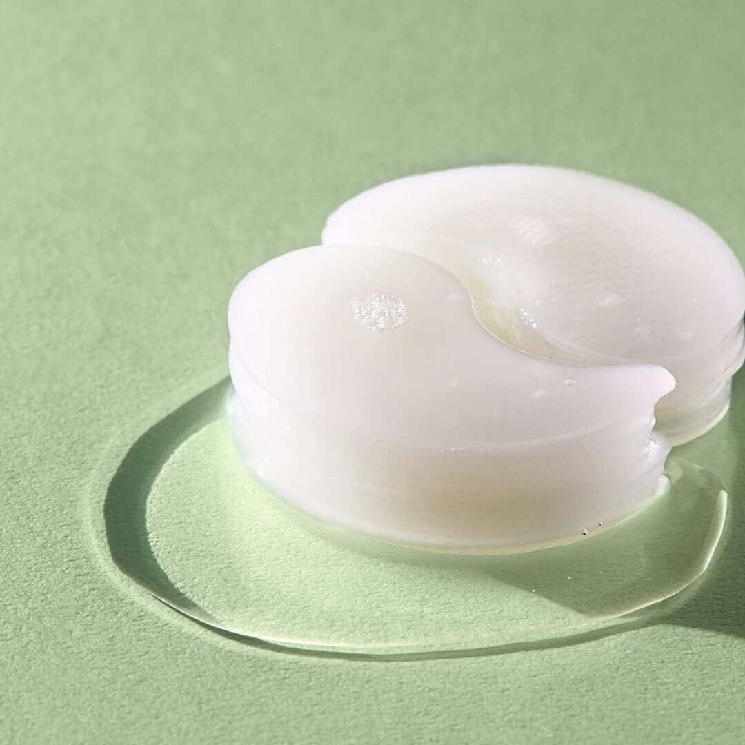 NATURE REPUBLIC Real Sueeze Aloe Vera Hydrogel Eye Patchh 60sheets on a green background